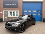 BMW 1-Serie 116i Sport | Leder | Nav | 18" LM | LED, 1-Serie, Achterwielaandrijving, 1280 kg, Zwart