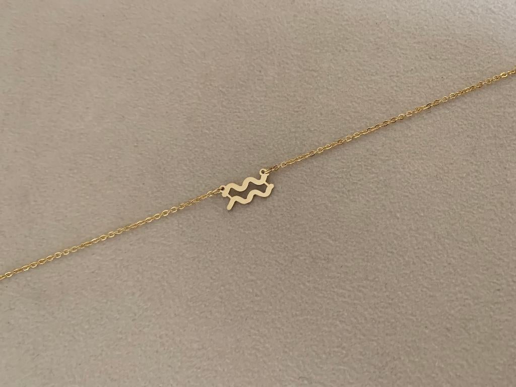 Gouden ketting met sterrenbeeld bedel waterman waterproof, Nieuw, Ophalen of Verzenden, Goud, Overige materialen