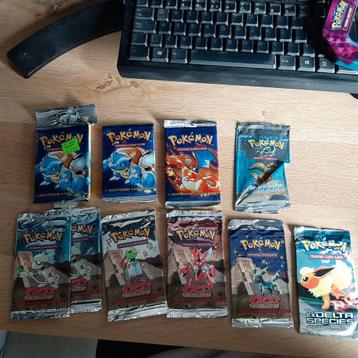 Geopende boosterpacks o.a. base set, neo discovery 1st beschikbaar voor biedingen