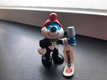 De Smurfen jubileum grote smurf met pak en glas