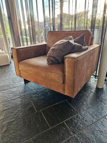 fauteu stoel bruin met zwart stalen onderstel