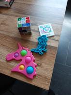 Vier nieuwe fidget toys, Ophalen