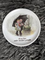 Theetip Ot en Sien onder de paraplu, Huis en Inrichting, Keuken | Servies, Ophalen of Verzenden, Zo goed als nieuw, Glas, Overige stijlen
