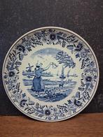 Wandbord  boch Delfts   wuivende boerin, Ophalen of Verzenden