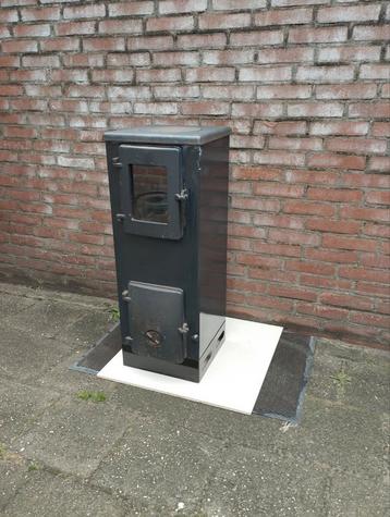 Alfa plam vulkan s hout kachel zeer nette staat.  beschikbaar voor biedingen
