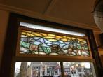 Mooi geschilderd glas in lood, Ophalen