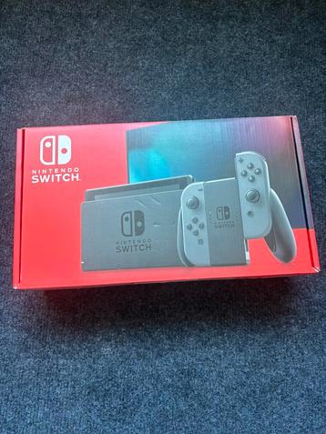 Nintendo switch grijs v2 compleet met eventueel games beschikbaar voor biedingen