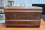 Naumann naaimachine, Ophalen