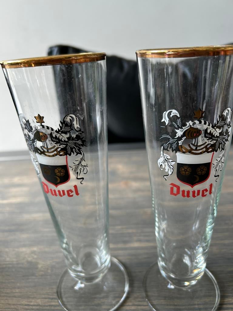 Duvel verzamelglazen met wapenschild 2 stuks, Ophalen of Verzenden, Gebruikt, Bierglas