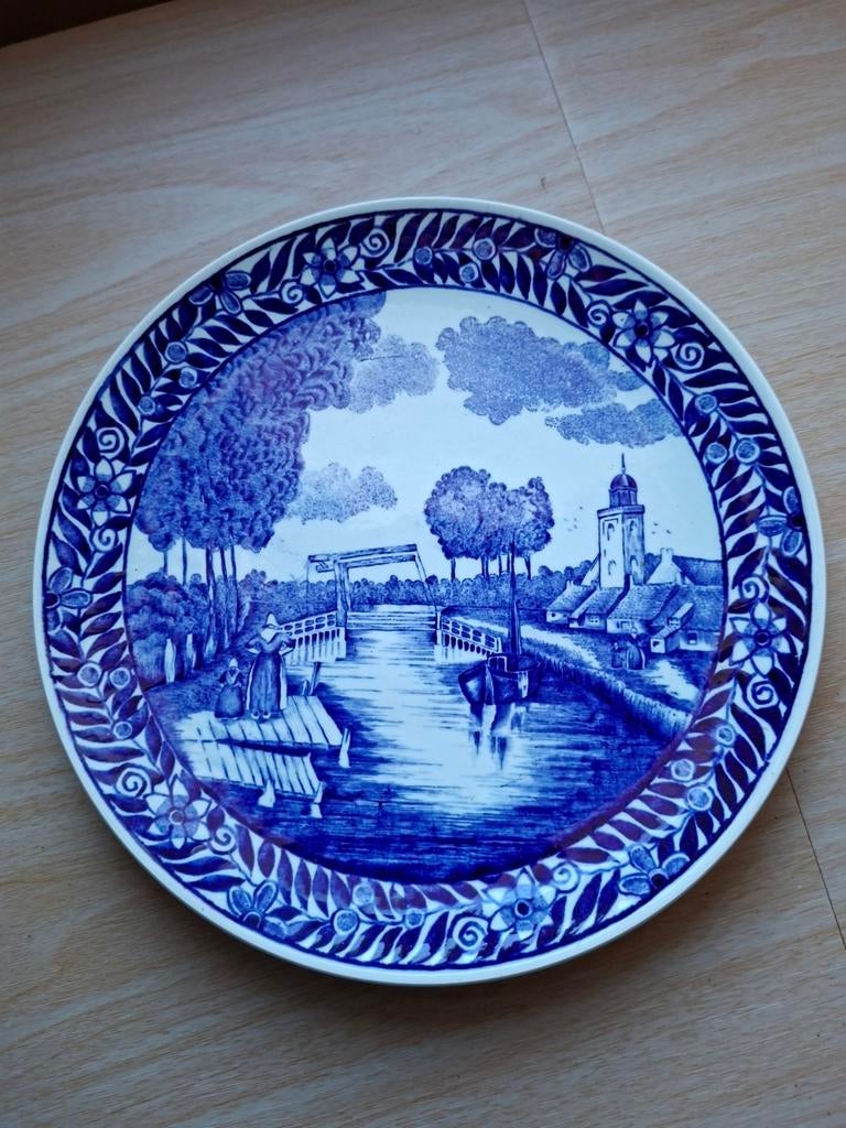 Delftsblauwe borden en vazen, Ophalen