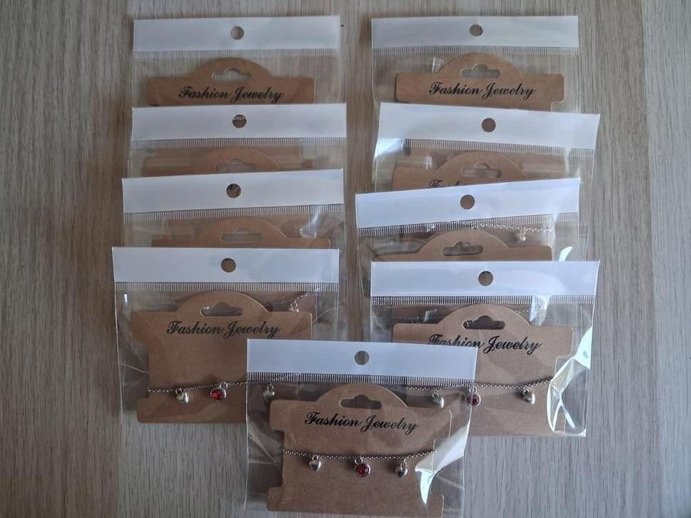 9x Kinderbedelarmbandjes - Zilverkleurig en Rood, Sieraden, Tassen en Uiterlijk, Kindersieraden, Nieuw, Armband, Rood, Ophalen of Verzenden