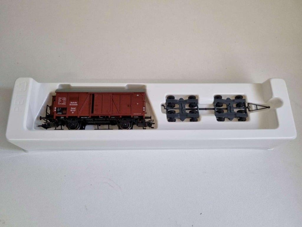 Märklin 46821 - Goederenwagon + Straßenroller van de DR, Hobby en Vrije tijd, Modeltreinen | H0, Wisselstroom, Wagon, Ophalen of Verzenden