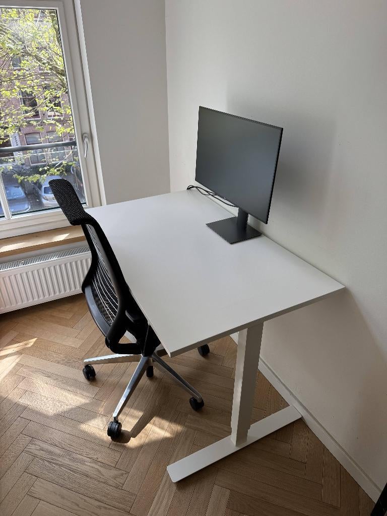 IKEA Skarsta zit-sta bureau 120x70 wit in hoogte verstelbaar, Zit-sta bureau, Gebruikt, Spaanplaat of MDF, Ophalen of Verzenden