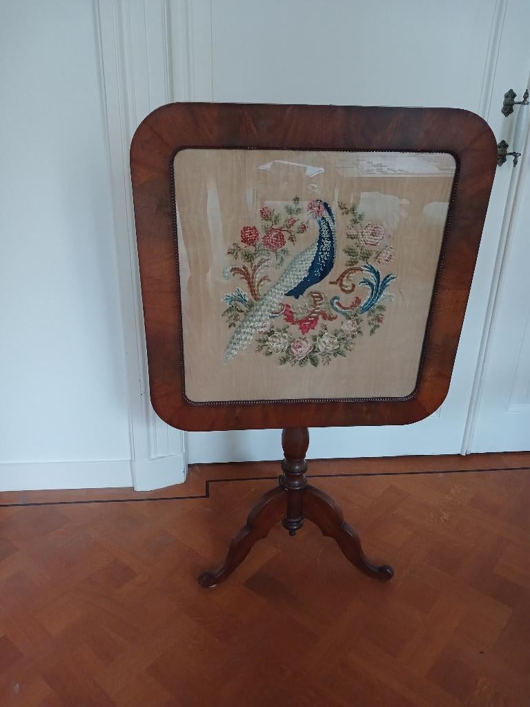 geborduurd haardscherm, Ophalen