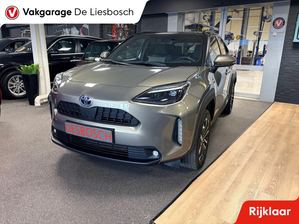 Toyota Yaris Cross 1.5 Hybrid Dynamic/navi / panoramadak / c, Stof, Gebruikt, 1490 cc, Bedrijf
