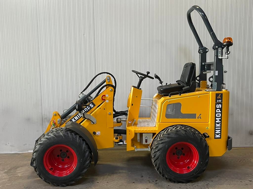 Knikmops 140, Ophalen, Wiellader of Shovel