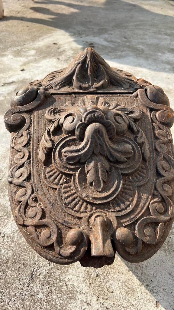 Antieke gietijzere schildpad, Ophalen