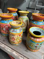 Nepalese melkpotten handbeschilderd, Ophalen