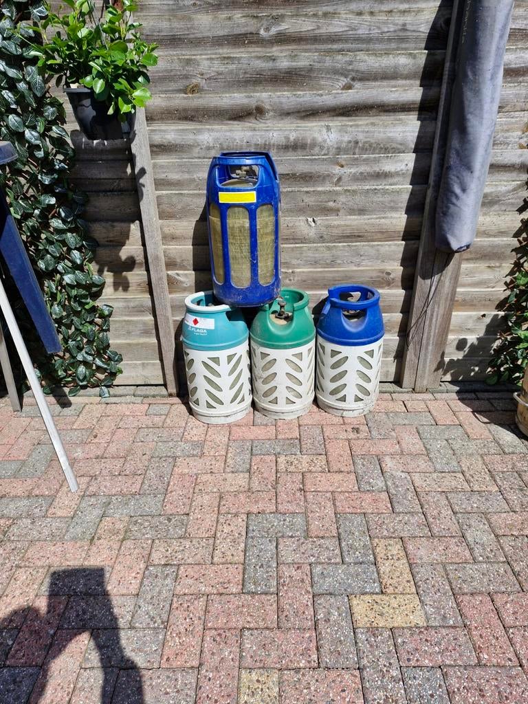 4 kunststoffen gasflessen  10 kg., Caravans en Kamperen, Caravan accessoires, Ophalen