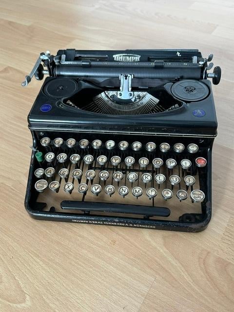 Triumph Antieke Typemachine, Ophalen