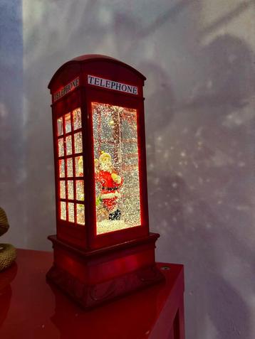 Kerst telefooncel met sneeuw glitter effect beschikbaar voor biedingen