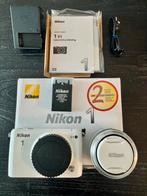 Nikon 1 S1, Audio, Tv en Foto, Fotocamera's Digitaal, Ophalen of Verzenden, Zo goed als nieuw, Nikon, Minder dan 4 keer