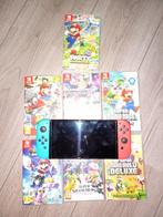 Nintendo switch oled mario editie, Spelcomputers en Games, Spelcomputers | Nintendo Switch, Met games, Zo goed als nieuw, Met 3 controllers of meer