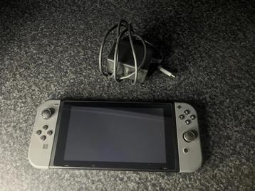 Nintendo Switch Handheld Console PAL Joy-Cons met lader beschikbaar voor biedingen