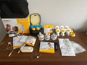 Medela Freestyle Flex pump with complete set and extras