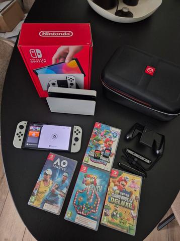Nintendo Switch OLED Wit + 6 Games + Accessoires beschikbaar voor biedingen