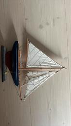 Houten modelschip zeilboot, Ophalen