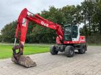 1999 O&K MH Plus Banden graafmachine, Zakelijke goederen, Machines en Bouw | Kranen en Graafmachines, Graafmachine