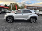 Toyota Yaris Cross 1.5 HYBRID 130PK STUUR+STOELVERWARMING PD, Stof, Gebruikt, Met garantie (alle), Grijs