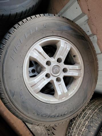 3x set winterbanden met lichtmetalen velgen volvo xc en kia  beschikbaar voor biedingen