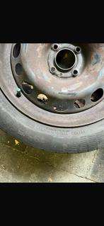 Stalen velgen met winterbanden., Ophalen