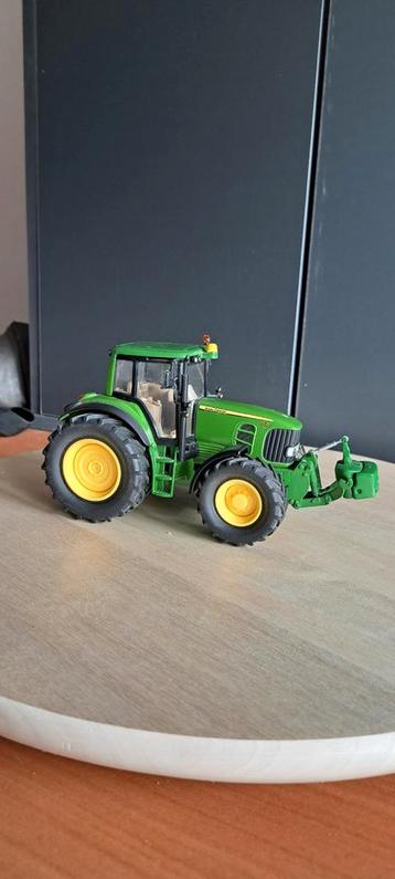 Verbouwde John Deere 7530 met fronthef  beschikbaar voor biedingen