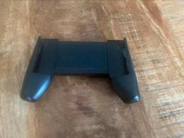 Telefoon game houder beschikbaar voor biedingen