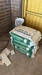 Egalisatiemortel 5 X 25KG, Doe-het-zelf en Verbouw, Overige Doe-het-zelf en Verbouw, Ophalen, Zo goed als nieuw