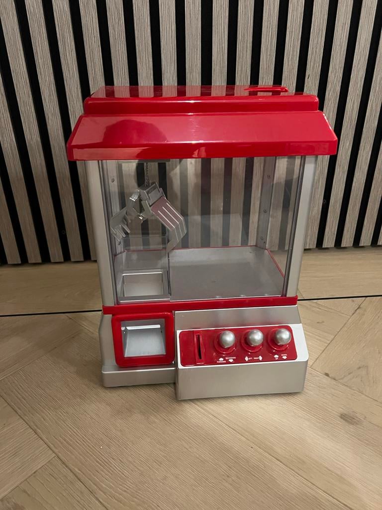 Grijpmachine met muntjes - Plastic, Kinderen en Baby's, Speelgoed | Overig, Ophalen of Verzenden, Gebruikt, Jongen of Meisje