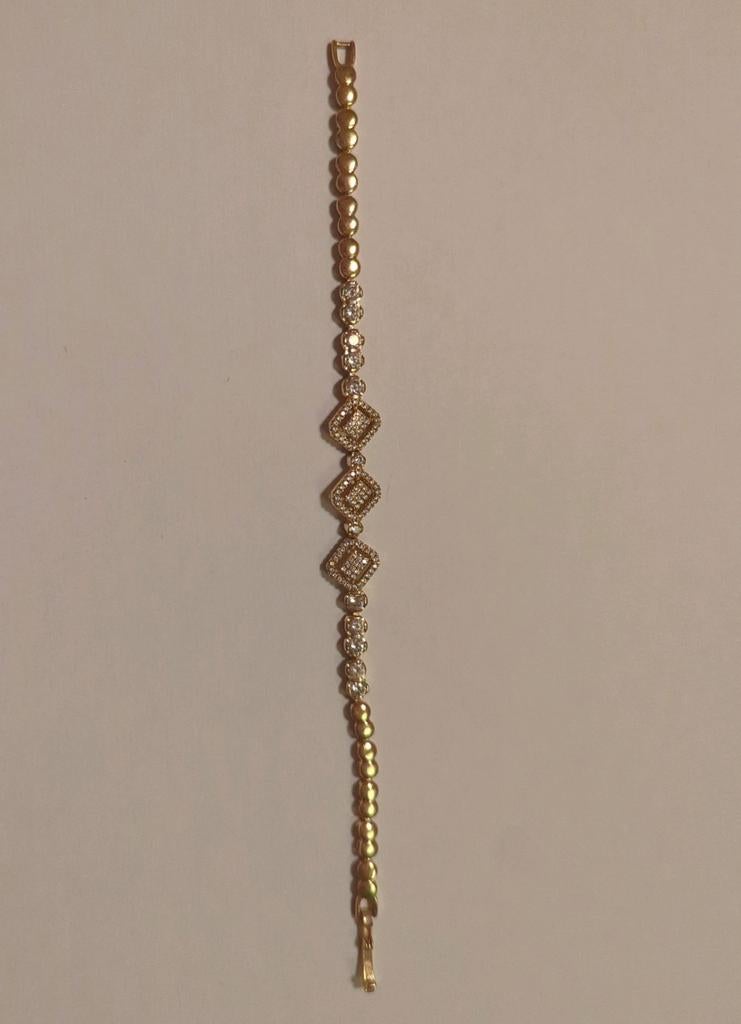 Gouden armband, Sieraden, Tassen en Uiterlijk, Armbanden, Met kristal, Kunststof of Plastic, Ophalen of Verzenden, Zo goed als nieuw