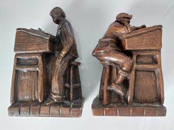 2 Zware Boekensteunen 2 personen aan lessenaar beschikbaar voor biedingen