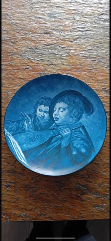 Prachtig wandbord “musicerende jongens” beschikbaar voor biedingen