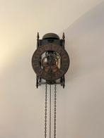 antieke Tempus Fugit wandklok, Ophalen