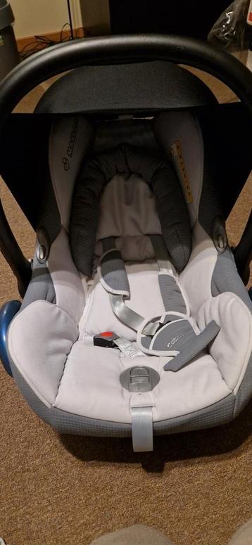 Maxi cosi met boekjes compleet  beschikbaar voor biedingen