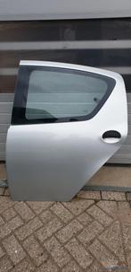 Portier LA Aygo Toyota links achter 67113-0H010 KTB bestuurd, Info@fabrikant.eu, Ophalen of Verzenden, Fabrikant BV, Gebruikt