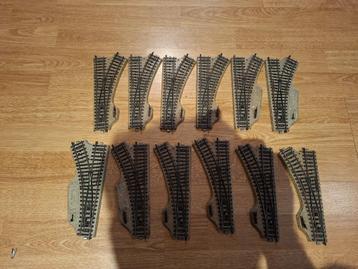 Doos vol rails (Marklin HO M-Rails) beschikbaar voor biedingen