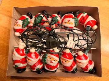 Vintage kerstverlichting met 10 kerstmannetjes beschikbaar voor biedingen