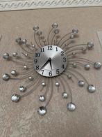 Klok met diamant details, Ophalen