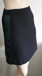 nieuw zwart NIKKIE rokje gevoerd met groene streep, Maat 38/40 (M), Verzenden, Zwart, Nieuw