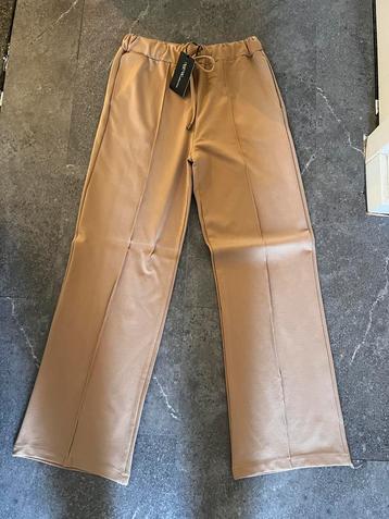 Travel stof pantalons, bomber jacks, 15 euro per stuk beschikbaar voor biedingen